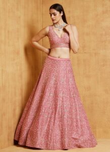 Traditional pink embroidered satin lehenga wedding wear