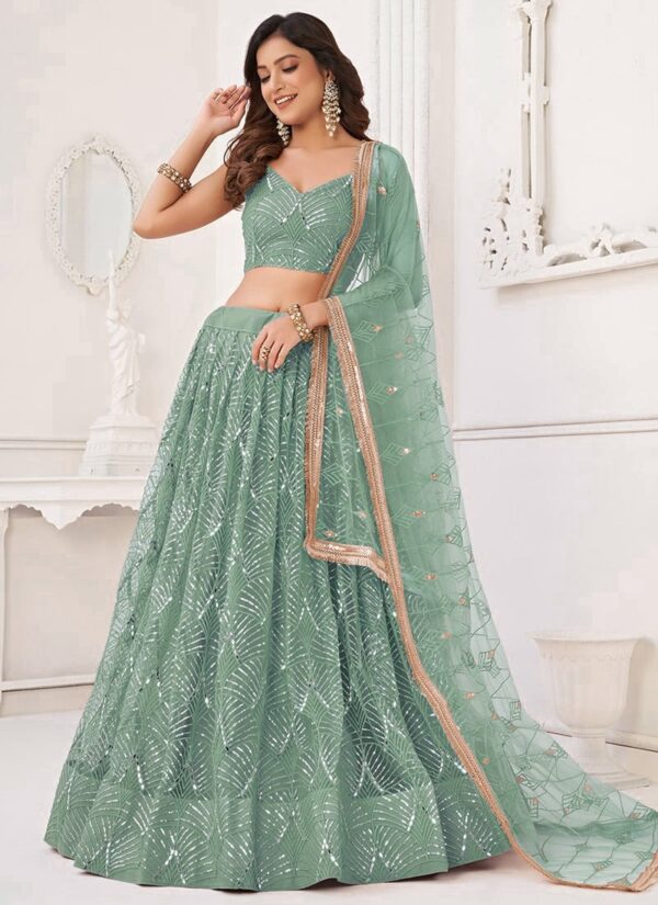 Turquoise net umbrella lehenga choli with heavy hand embroidery