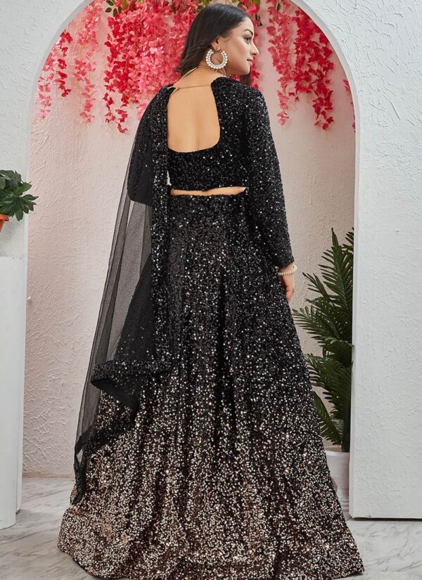 Black velvet umbrella lehenga choli with shimmery sequins and net dupatta back view