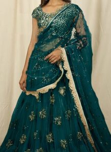 Teal green umbrella lehenga with sequins work wedding wear closeup view